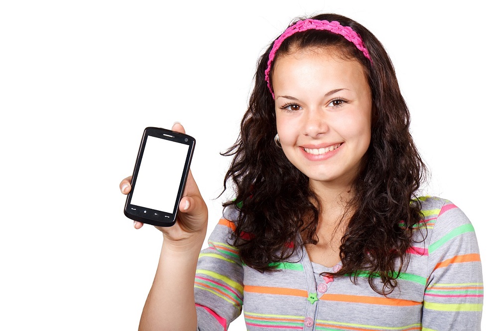 teen using a smartphone