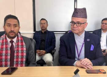 Communication Minister Jagdish Kharel with Ncell CEO Michael Foley