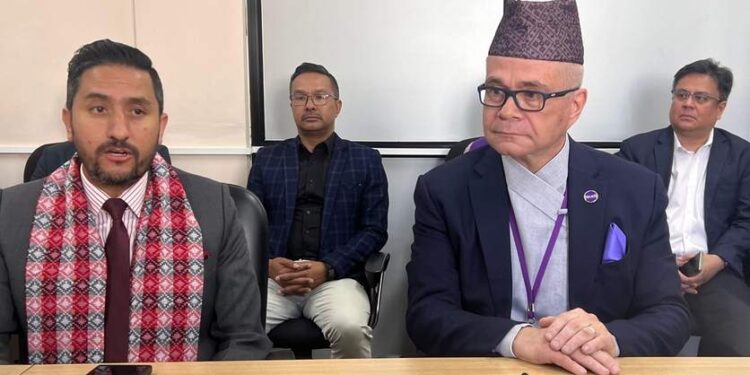 Communication Minister Jagdish Kharel with Ncell CEO Michael Foley