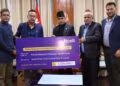 Ncell employees PM Disaster Relief Fund for Bhotekoshi flood